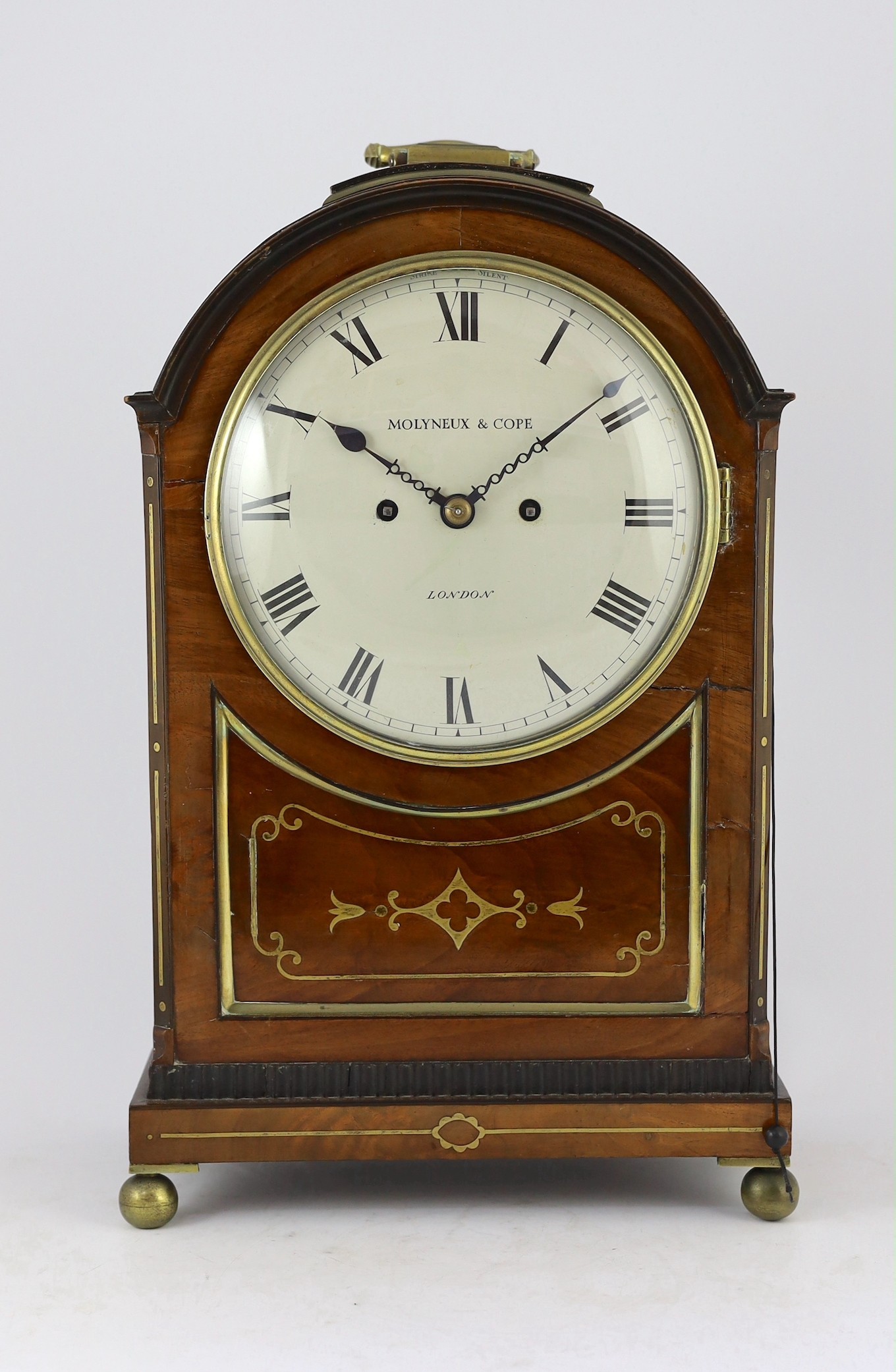 Molyneux & Cope of London. A Regency brass inset repeating bracket clock, 30cm wide 17cm deep 46cm high